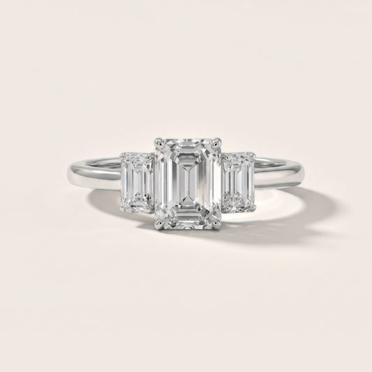 Marian Three-Stone Hidden Halo Emerald Diamond Engagement Ring in Platinum [studio-20261024]