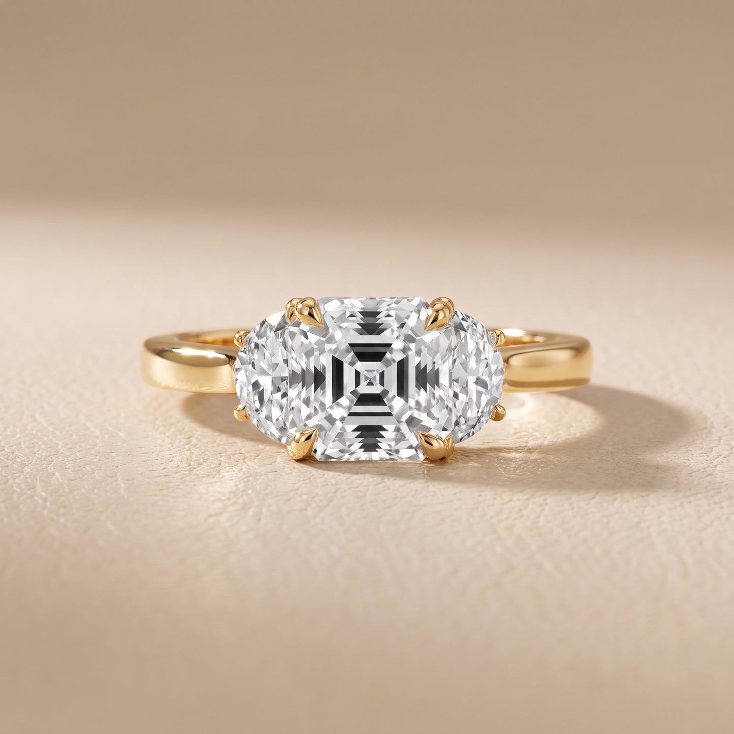 Romy Three-Stone Asscher Diamond Engagement Ring in Yellow Gold - front.jpg