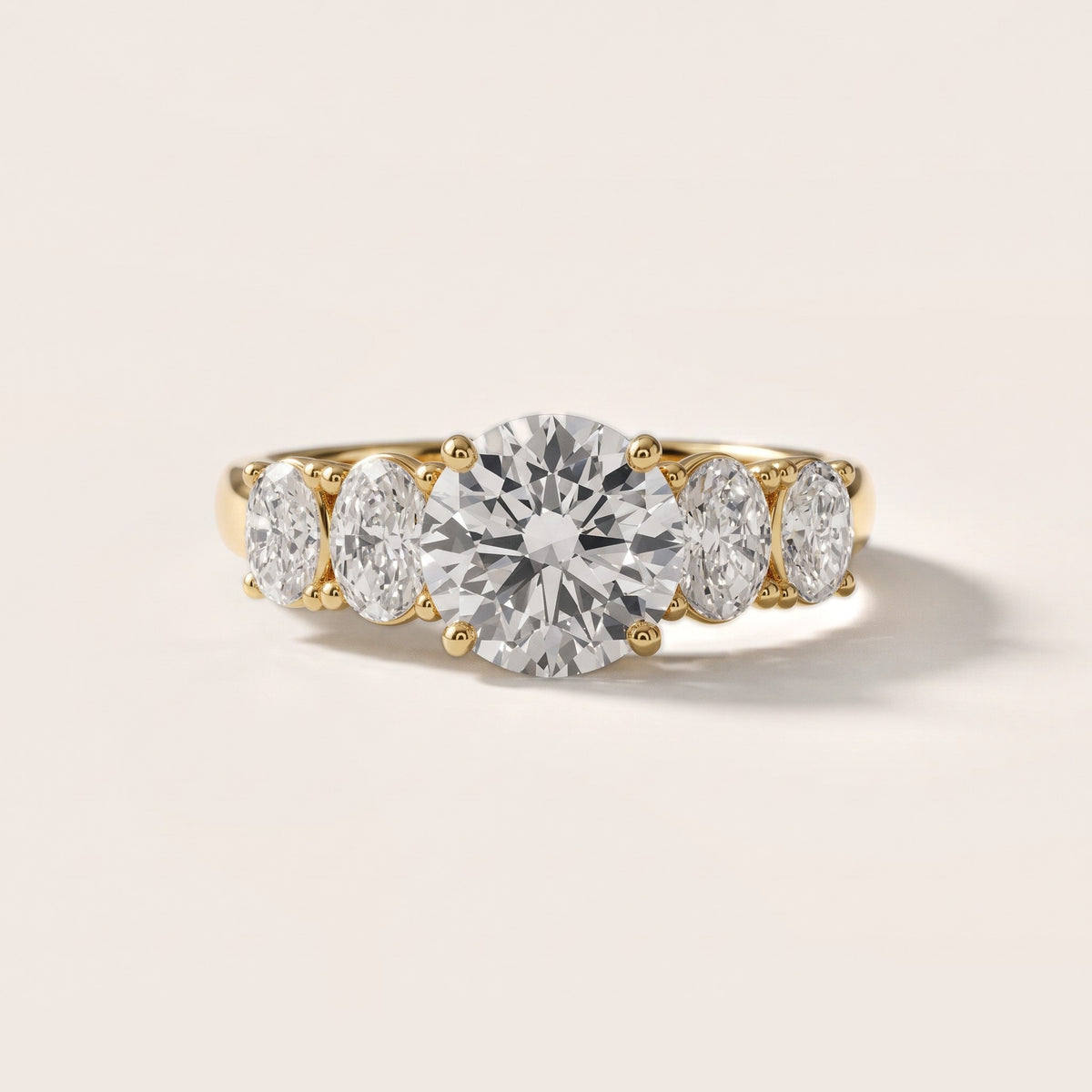 Judith Statement Five-Stone Round Diamond Engagement Ring in Yellow Gold - front.jpg