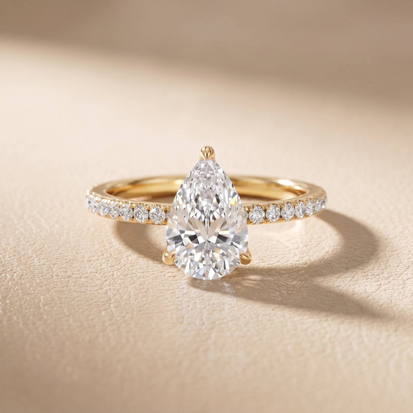 Ione Solitaire Pavé Pear Diamond Engagement Ring in Yellow Gold - front.jpg
