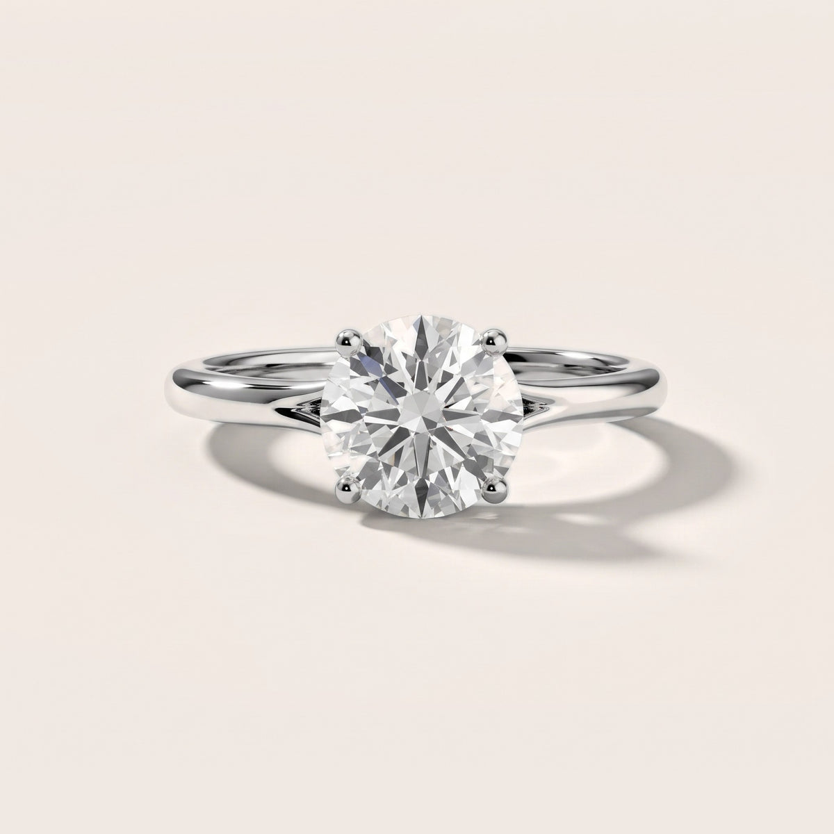 Melanie Solitaire Split Shank Round Diamond Engagement Ring in Silver - front.jpg