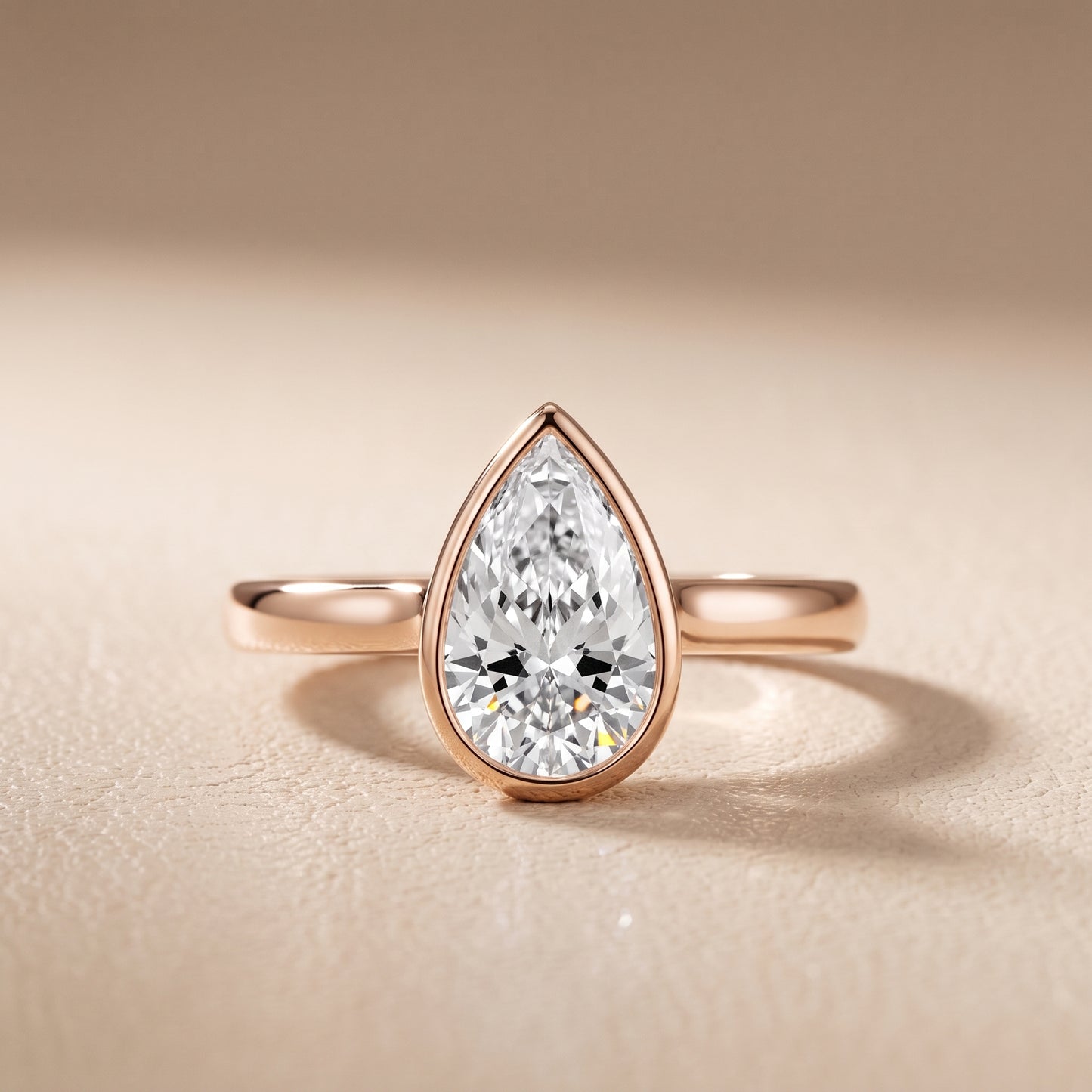 Jolie Bezel Solitaire Pear Diamond Engagement Ring in Rose Gold - front.jpg