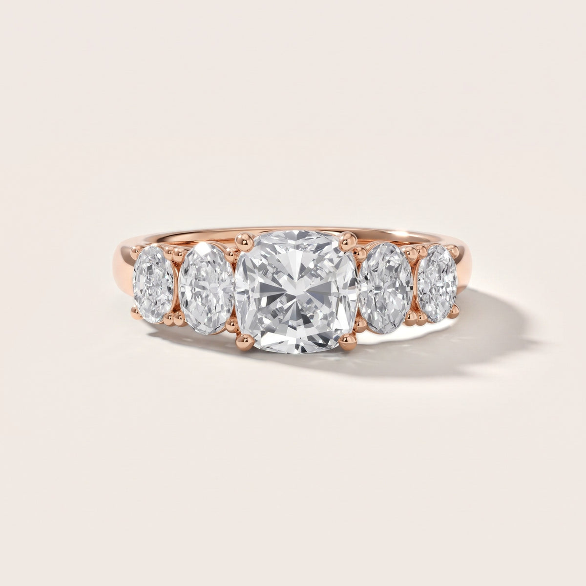 Judith Statement Five-Stone Cushion Diamond Engagement Ring in Rose Gold - front.jpg