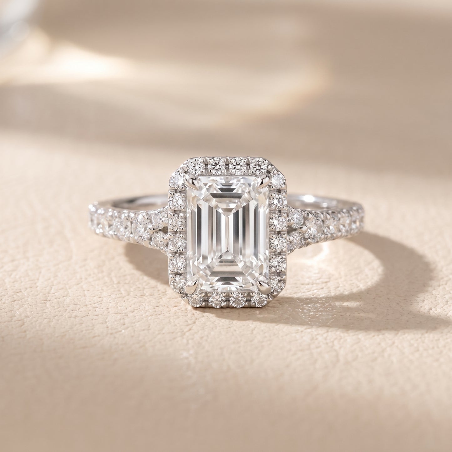Bella Halo Pavé Emerald Diamond Engagement Ring in Platinum - front.jpg