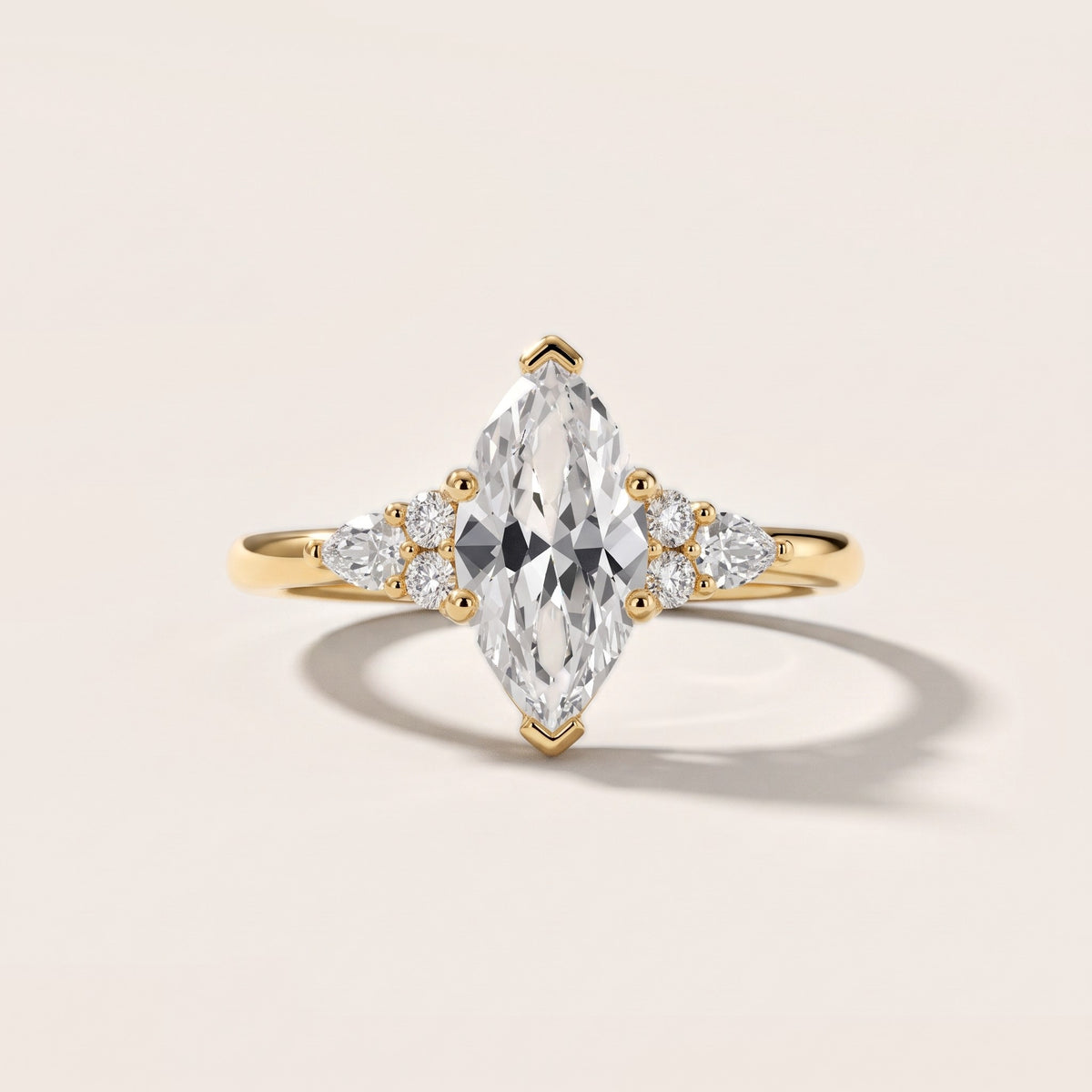 Zelie Pear-Side Cluster Marquise Diamond Engagement Ring in Yellow Gold - front.jpg
