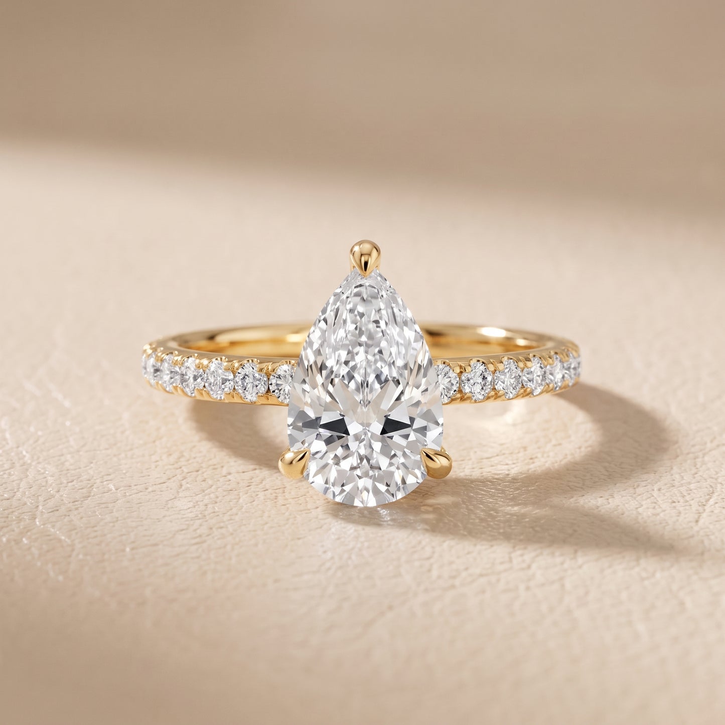 Maya Hidden Halo Pavé Pear Diamond Engagement Ring in Yellow Gold - front.jpg