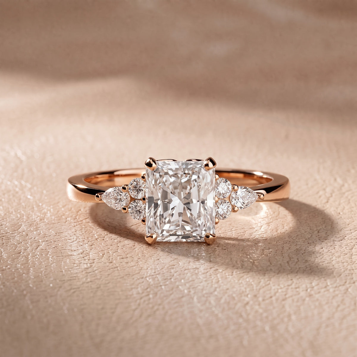 Amelia Three Stone Radiant Diamond Engagement Ring in Rose Gold - front.jpg