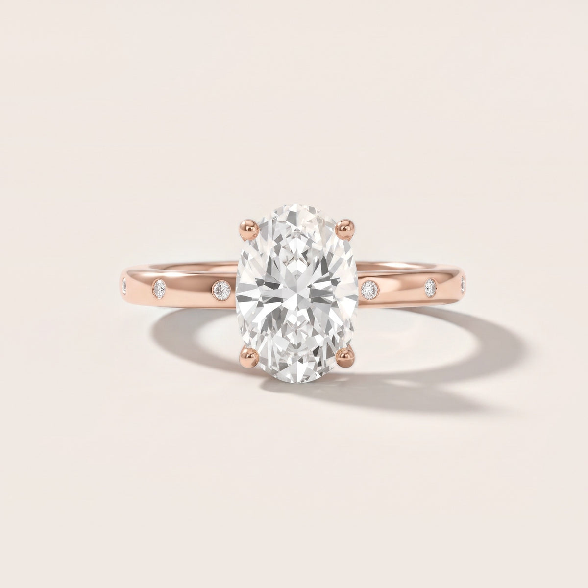 Dulcie Flush-Set Oval Diamond Engagement Ring in Rose Gold - front.jpg