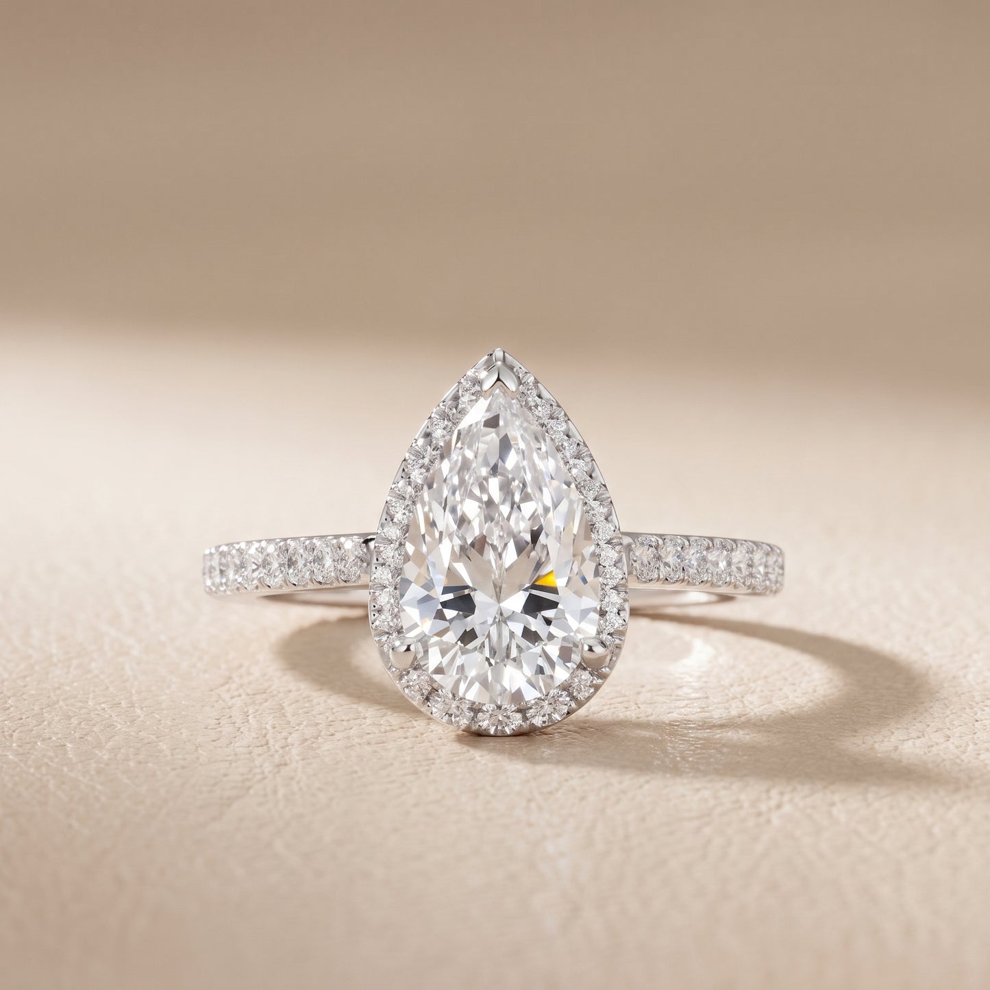 Alma Halo Pavé Pear Diamond Ring in Platinum - front.jpg