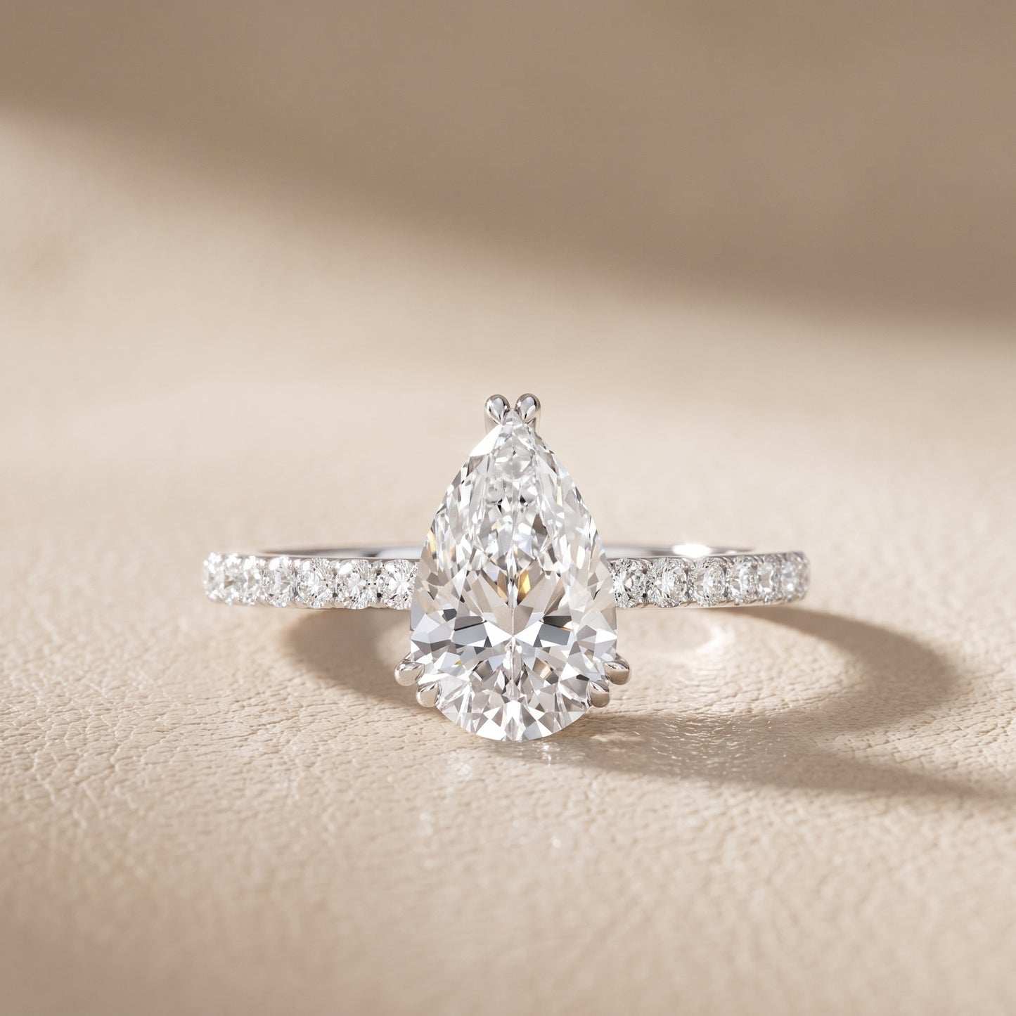 Novara Solitaire Pavé Pear Diamond Ring in Silver - front.jpg