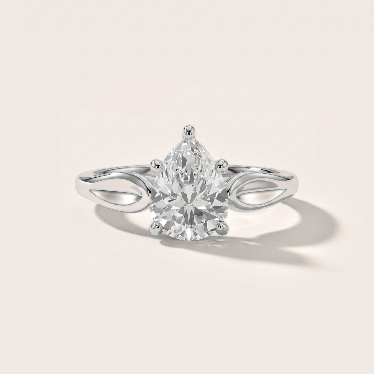 Lauretta Leaf Solitaire Pear Diamond Engagement Ring in Platinum - front.jpg