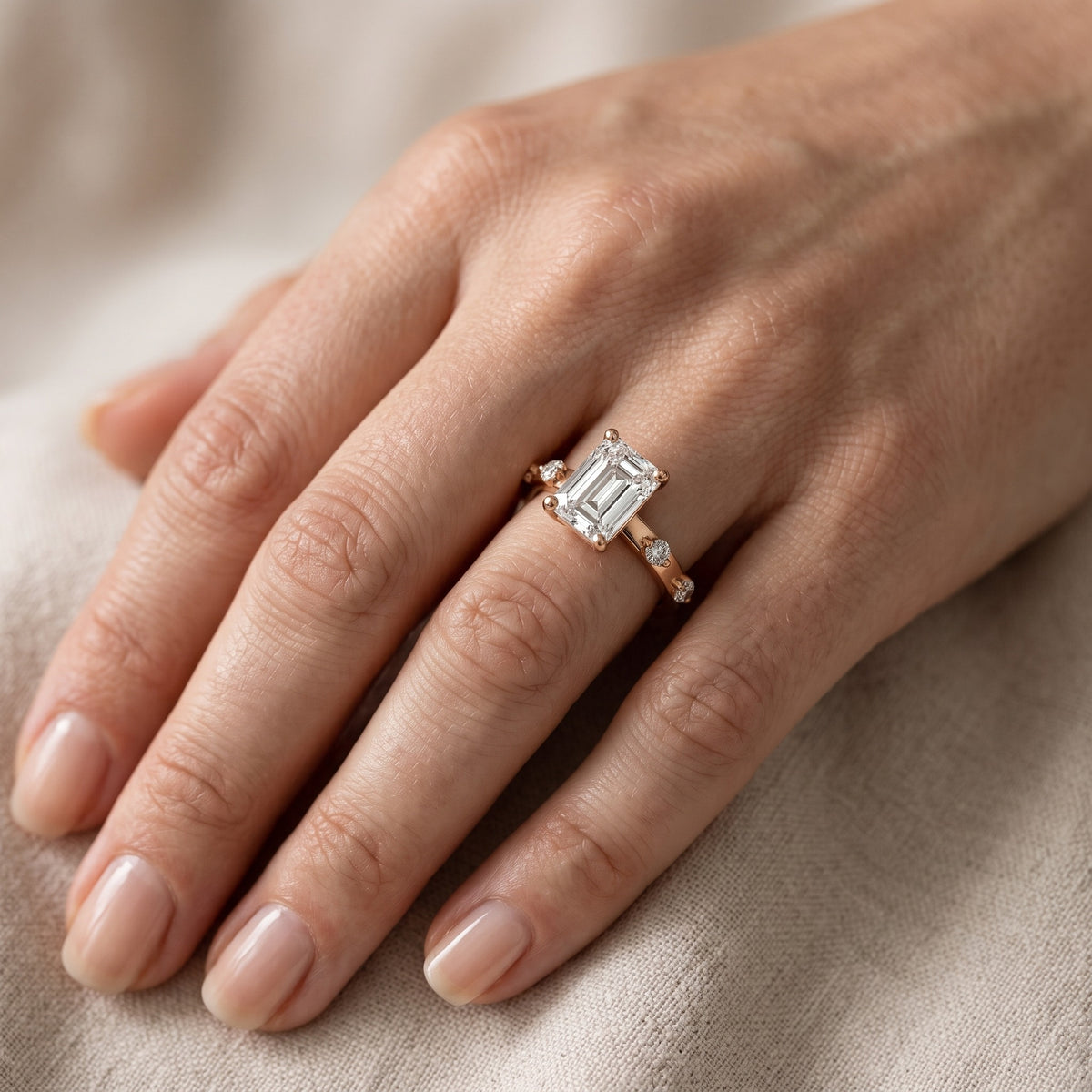 Elena Radiance Solitaire Emerald Diamond Engagement Ring in Rose Gold - lifestyle.jpg