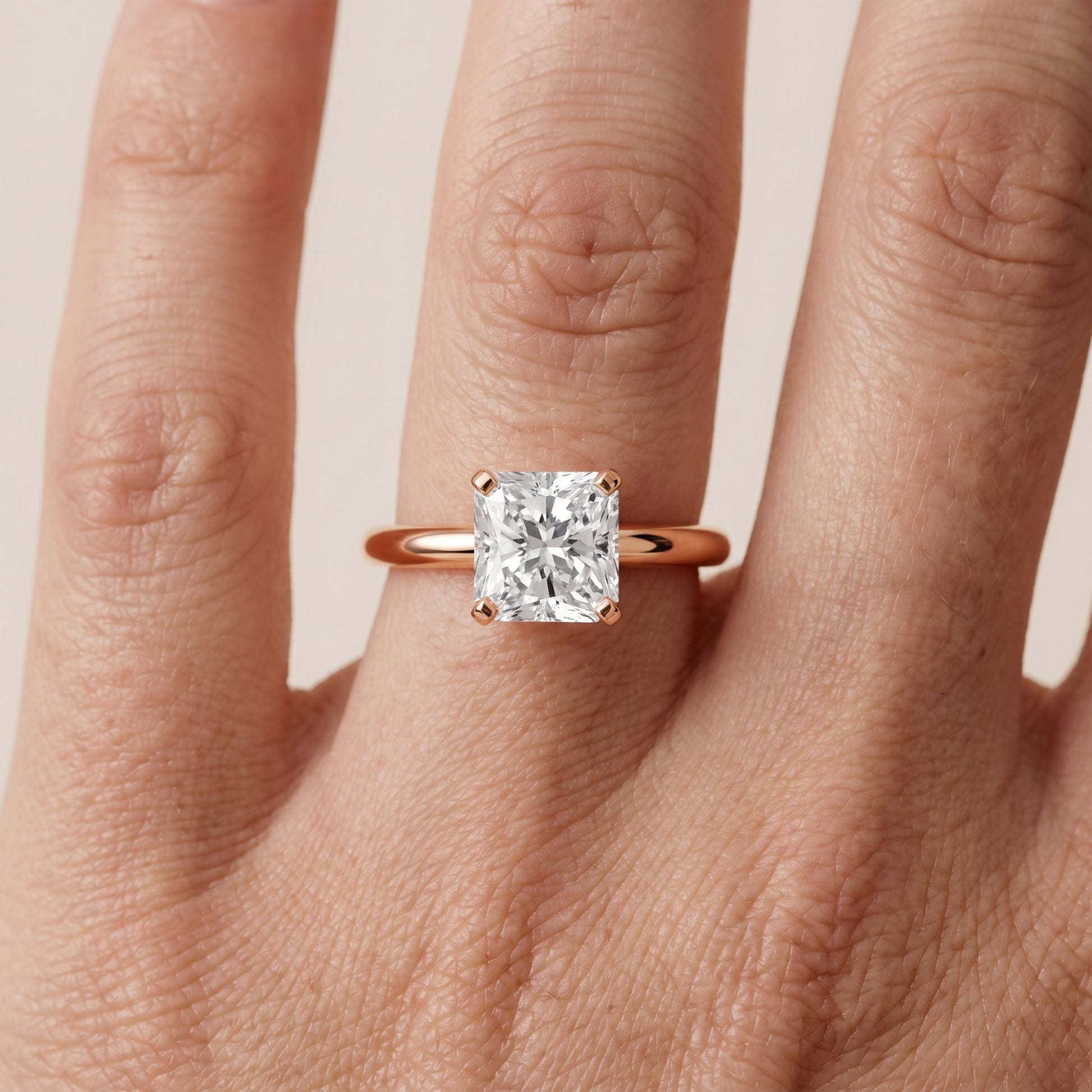 Wren Solitaire Radiant Diamond Ring in Rose Gold - lifestyle.jpg