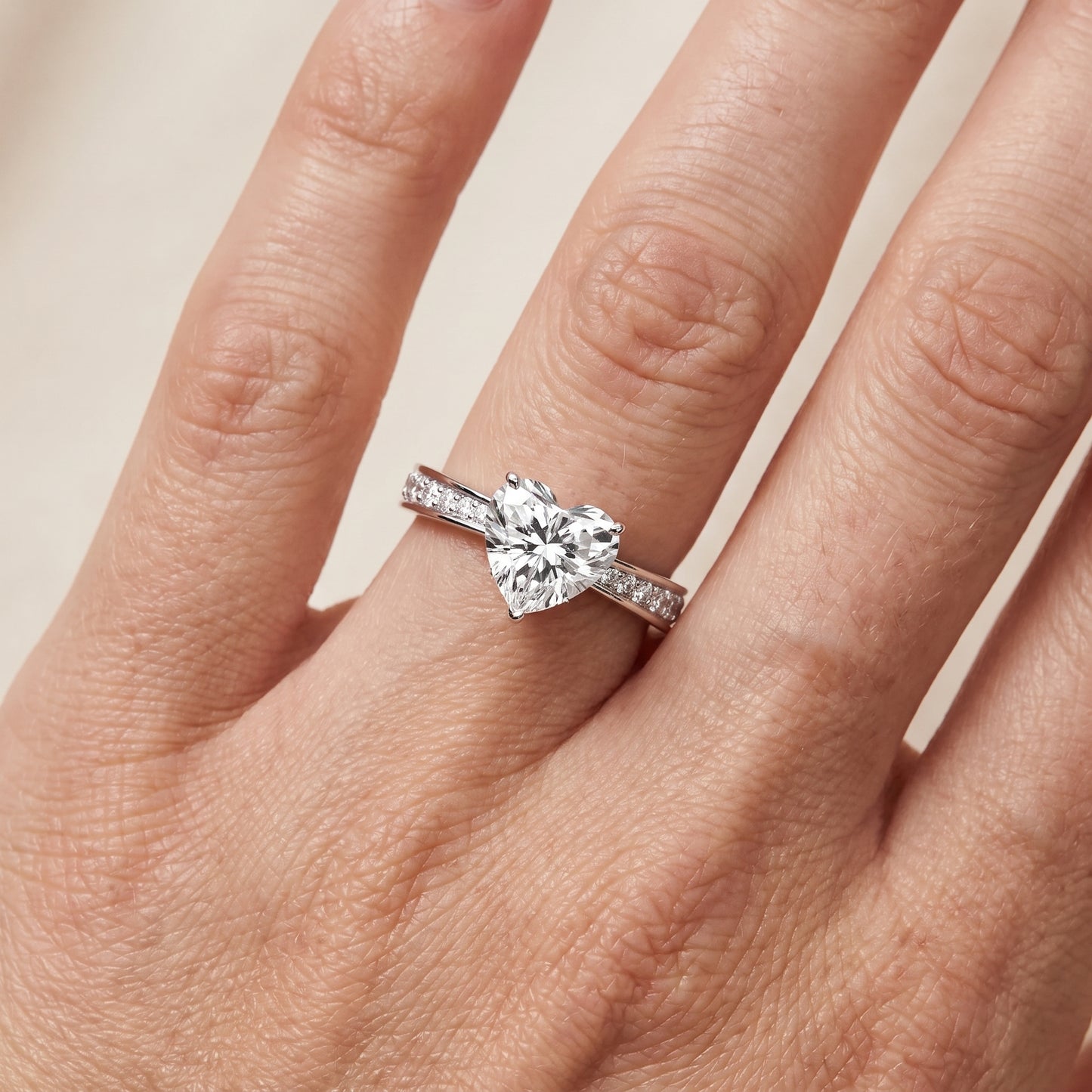 Rhea Sidestone Pavé Heart Diamond Engagement Ring in Silver - lifestyle.jpg