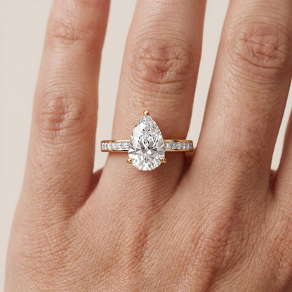 Maren Sidestone Channel Set Pear Diamond Engagement Ring in Yellow Gold - lifestyle.jpg
