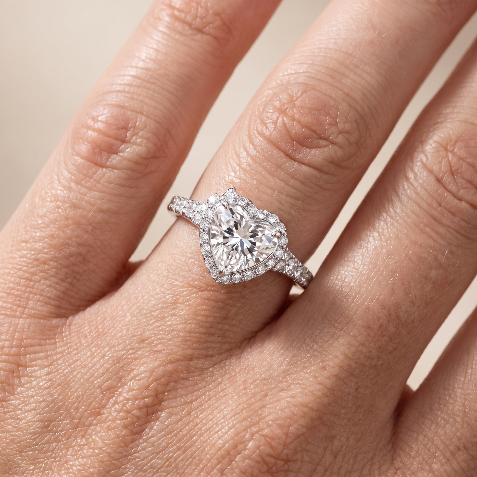 Bella Halo Pavé Heart Diamond Engagement Ring in Platinum - lifestyle.jpg
