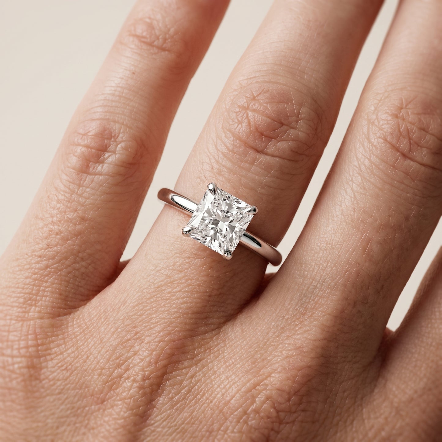 Nella Petite Solitaire Radiant Diamond Engagement Ring in Platinum - lifestyle.jpg