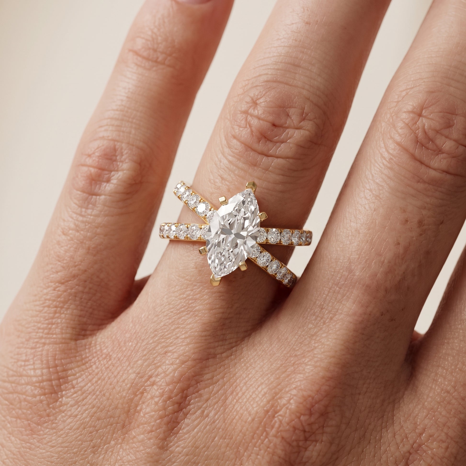 Lior Criss Cross Pavé Marquise Diamond Engagement Ring in Yellow Gold - lifestyle.jpg