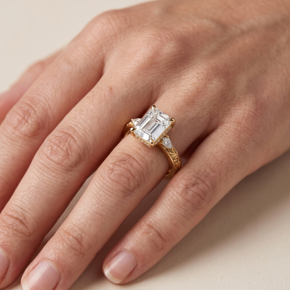 Siesta Three-Stone Engraved Emerald Diamond Engagement Ring in Silver - lifestyle.jpg