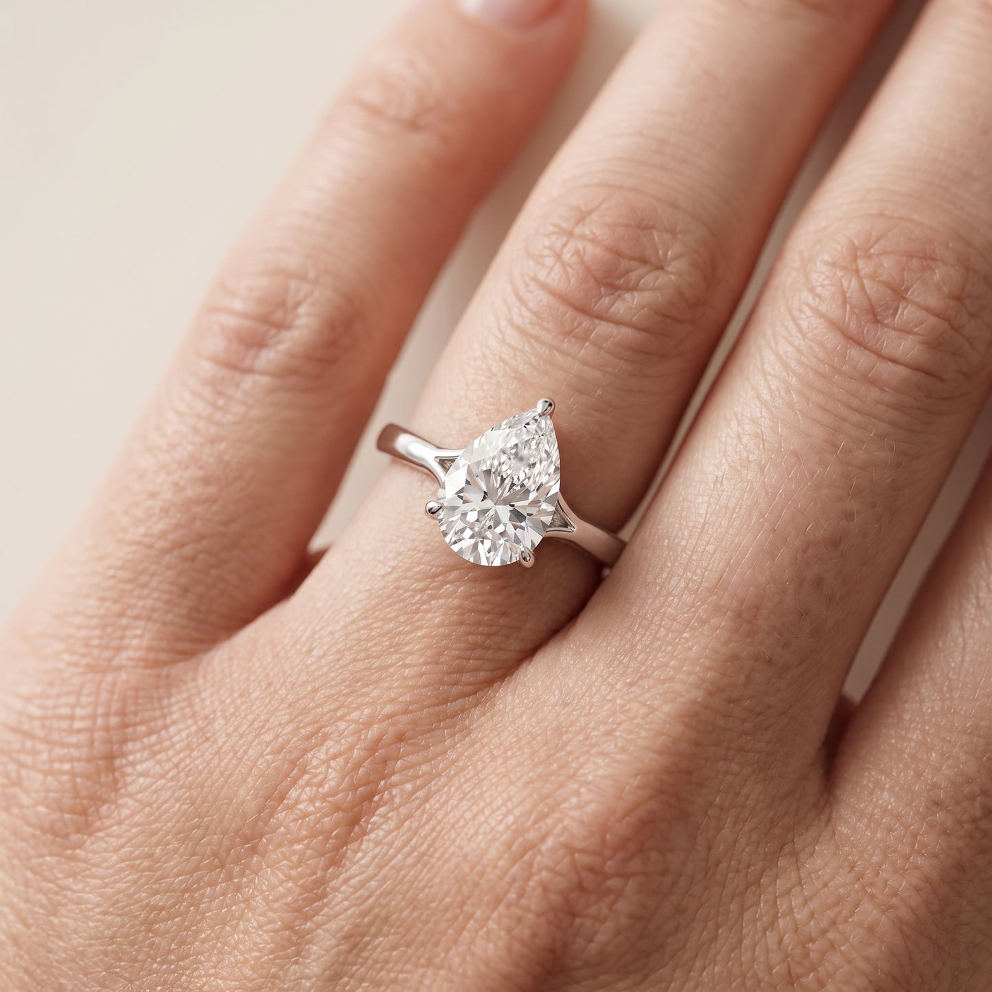Anais Trellis Solitaire Pear Diamond Engagement Ring in Platinum - lifestyle.jpg
