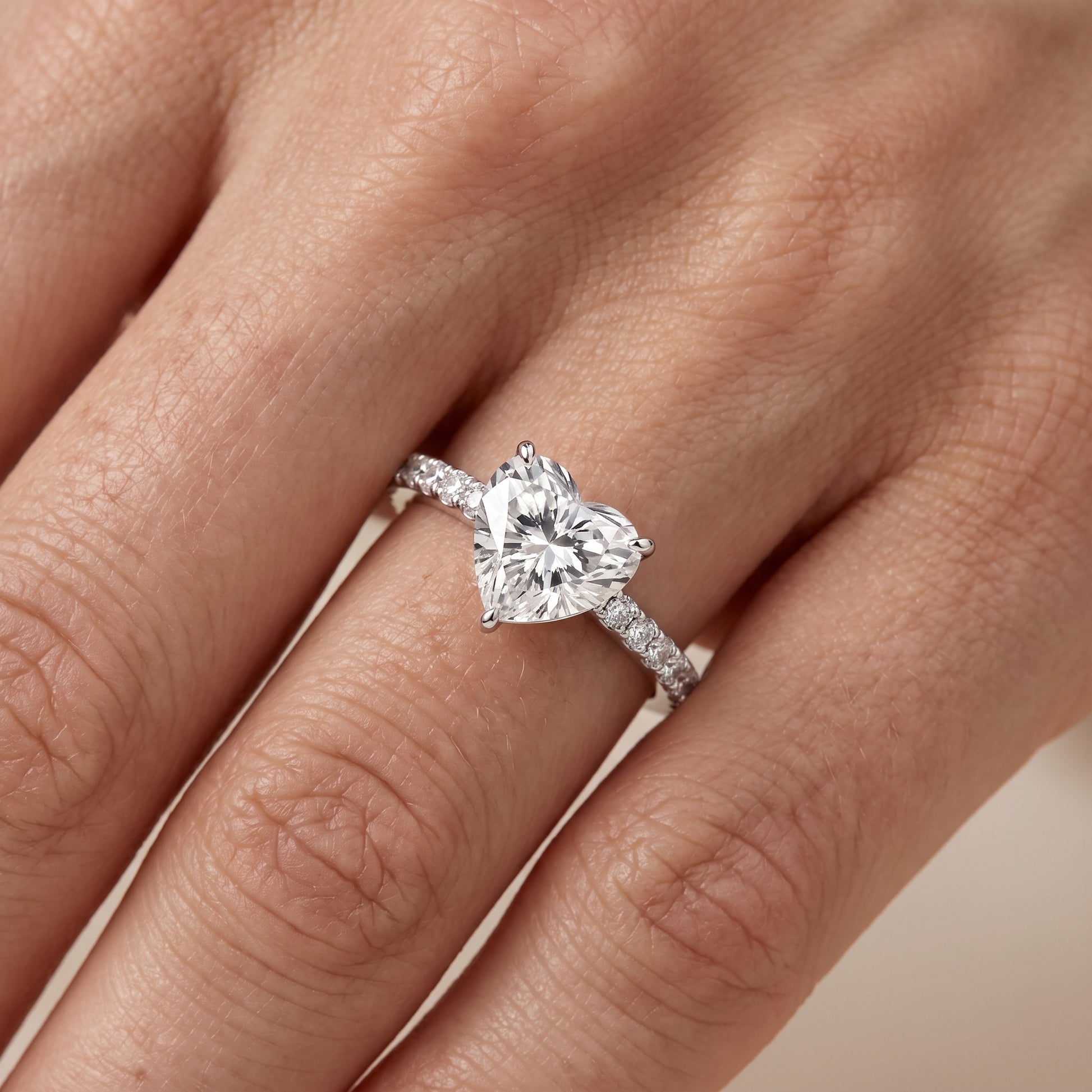 Aisha Pavé Solitaire Heart Diamond Engagement Ring in Platinum - lifestyle.jpg