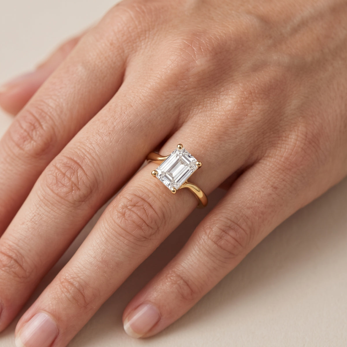 Clio Bypass Solitaire Emerald Diamond Engagement Ring in Silver - lifestyle.jpg