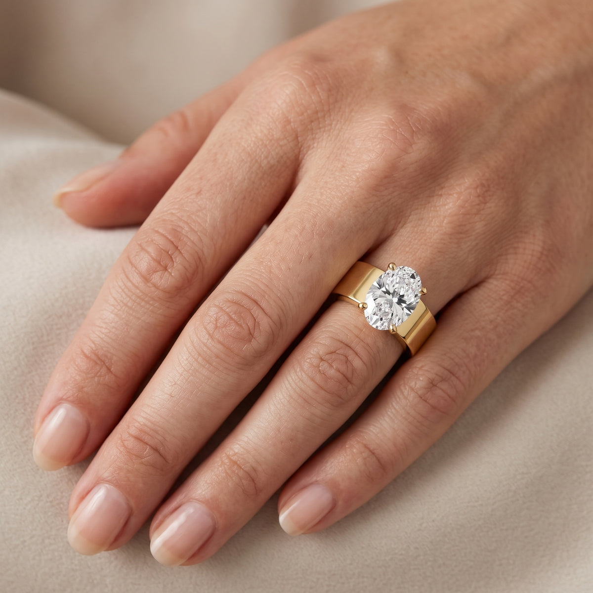 Susannah Wide Band Solitaire Oval Diamond Engagement Ring in Rose Gold - lifestyle.jpg