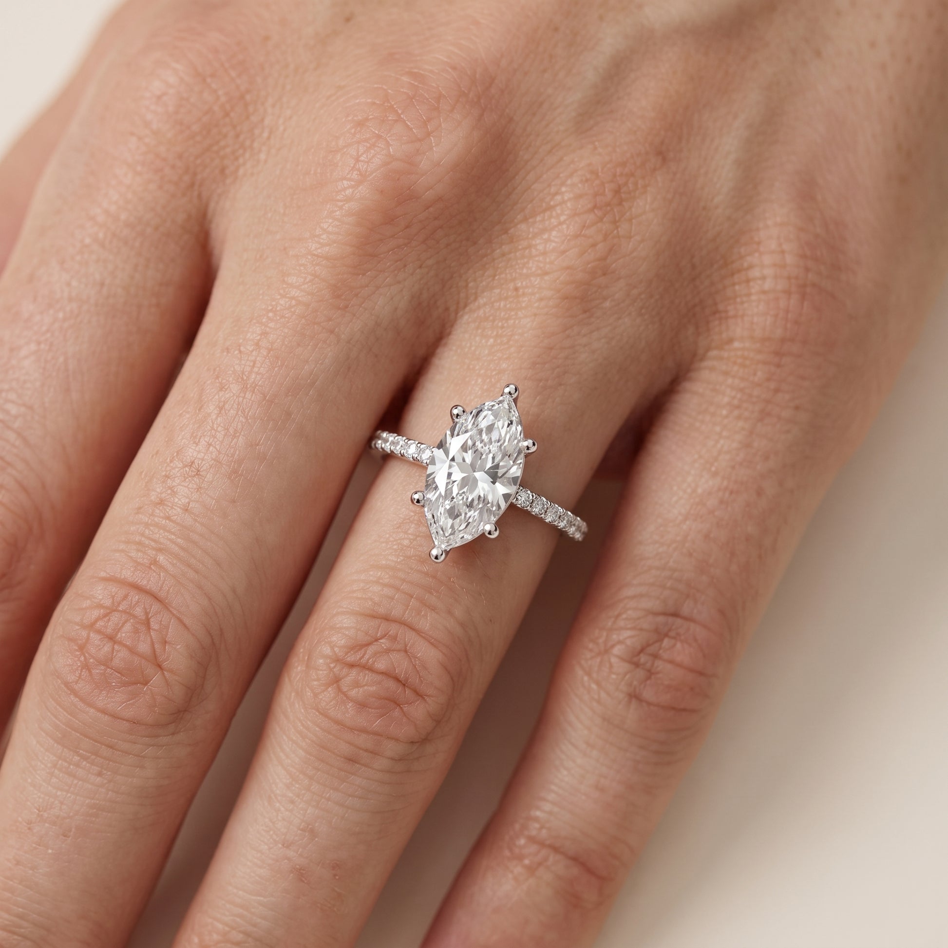 Rosie Solitaire Basket Marquise Diamond Engagement Ring in Platinum - lifestyle.jpg