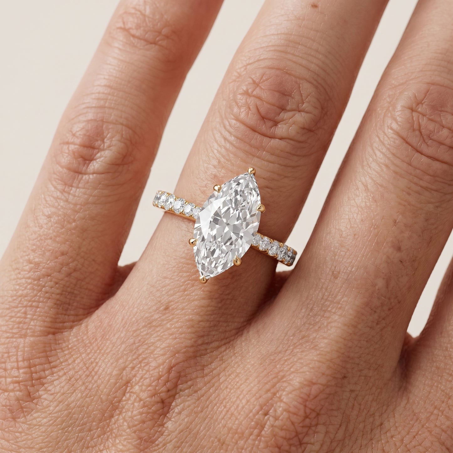 Gia Hidden Halo Pavé Marquise Diamond Ring in Yellow Gold - lifestyle.jpg