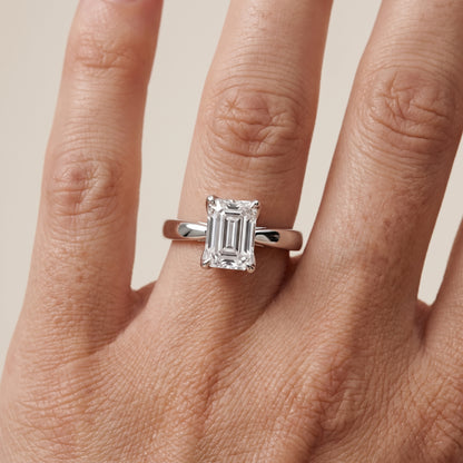Lucia Solitaire Six-Prong Emerald Diamond Engagement Ring in Platinum - lifestyle.jpg