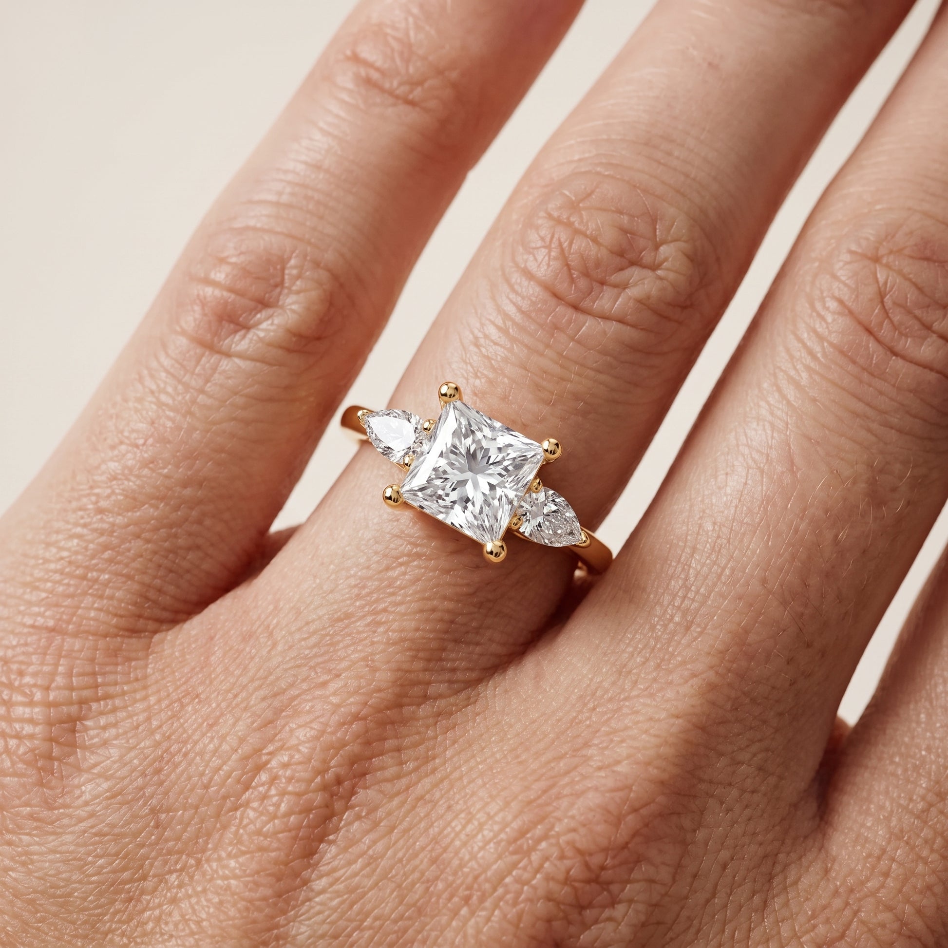 Faye Three-Stone Trellis Princess Diamond Ring in Yellow Gold - lifestyle.jpg