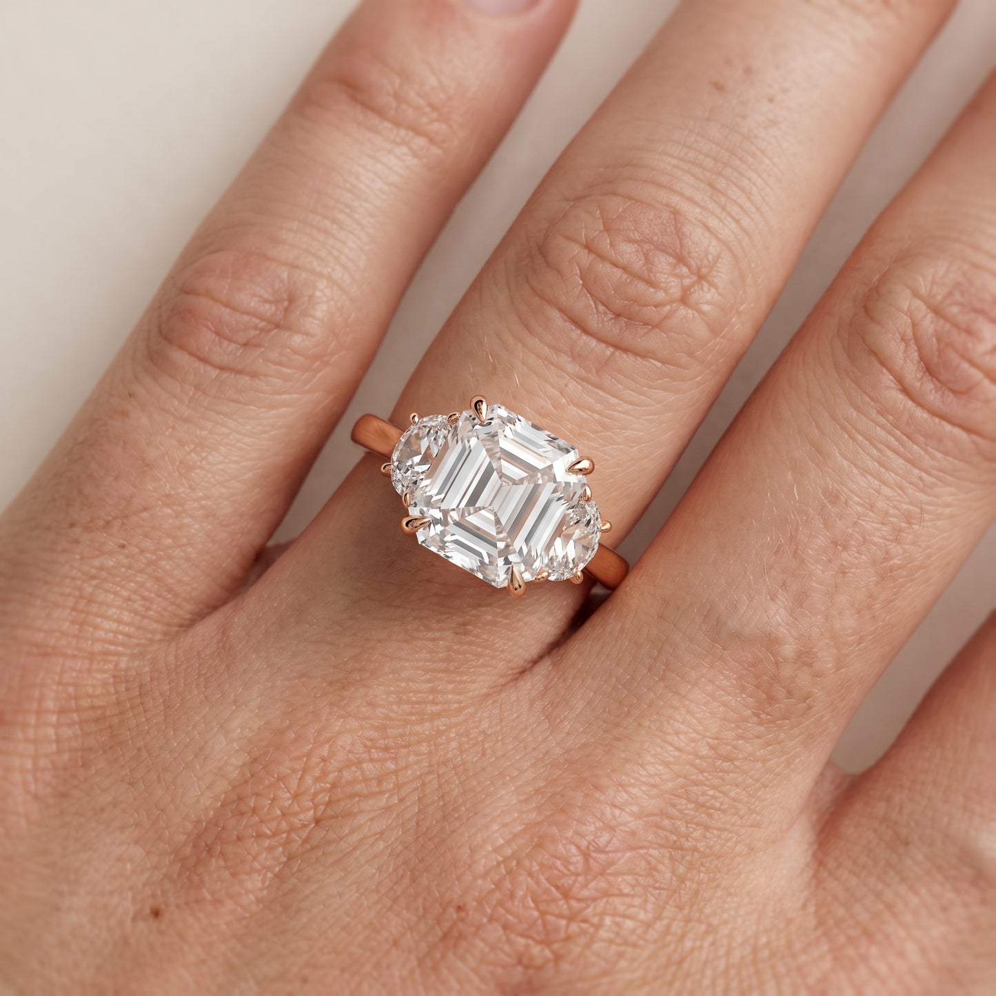 Romy Three-Stone Asscher Diamond Engagement Ring in Rose Gold - lifestyle.jpg