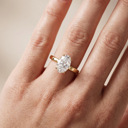 Delia Solitaire Oval Diamond Engagement Ring in Yellow Gold - lifestyle.jpg
