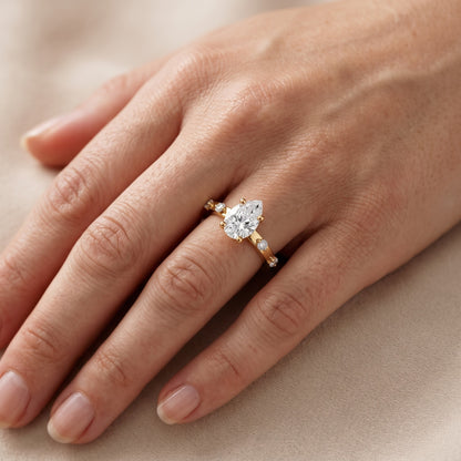 Elena Radiance Solitaire Pear Diamond Engagement Ring in Yellow Gold - lifestyle.jpg