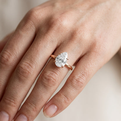 Charlotte Charm Solitaire Pear Diamond Engagement Ring in Rose Gold - lifestyle.jpg