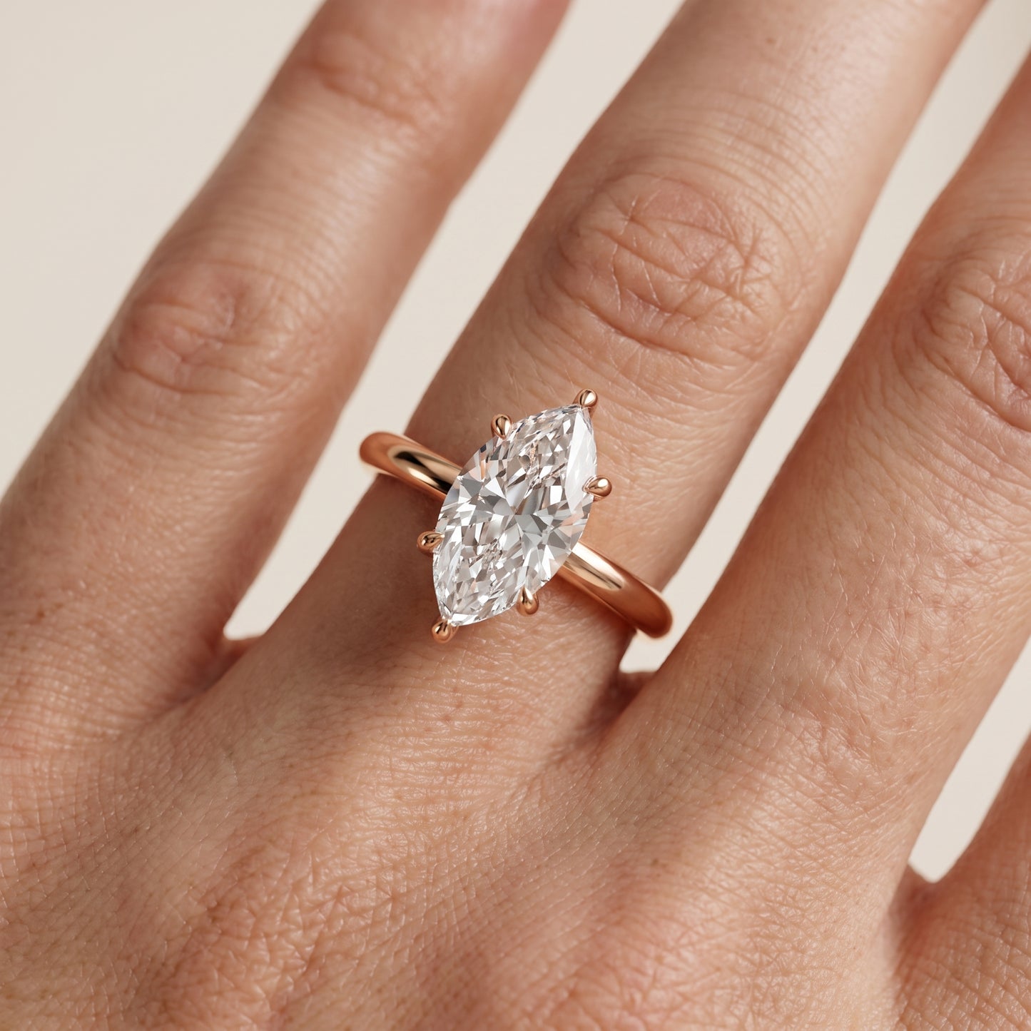 Amaya Hidden Halo Marquise Diamond Ring in Rose Gold - lifestyle.jpg