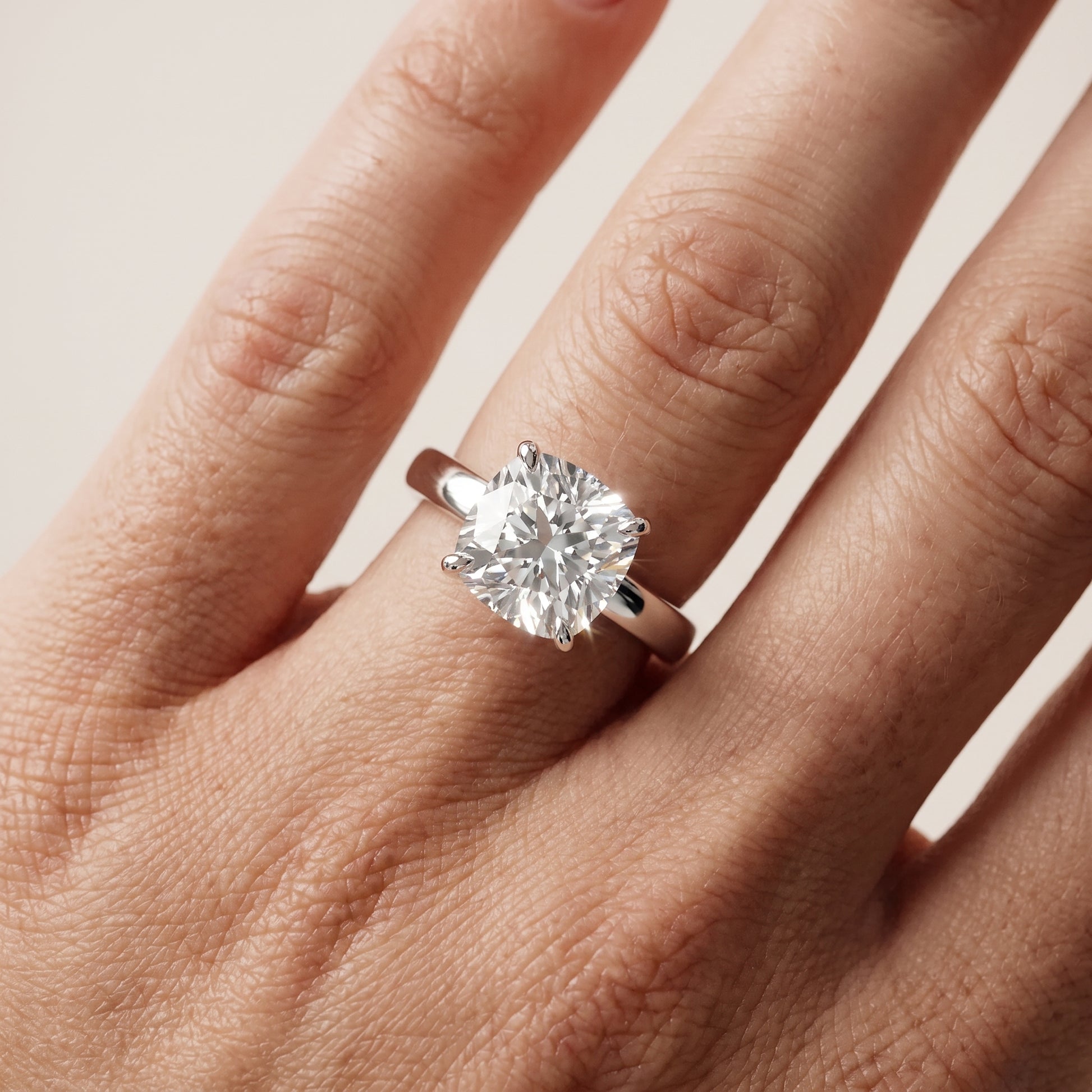 Lara Hidden Halo Cushion Diamond Engagement Ring in Platinum - lifestyle.jpg