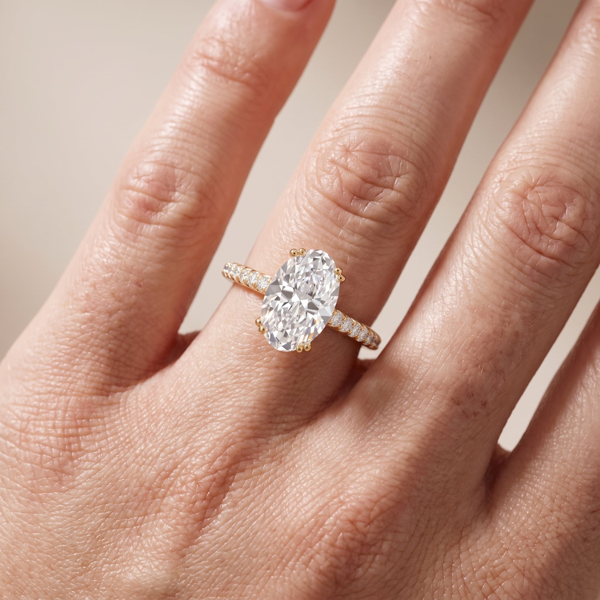Violet Hidden Halo Pavé Oval Diamond Ring in Yellow Gold - lifestyle.jpg