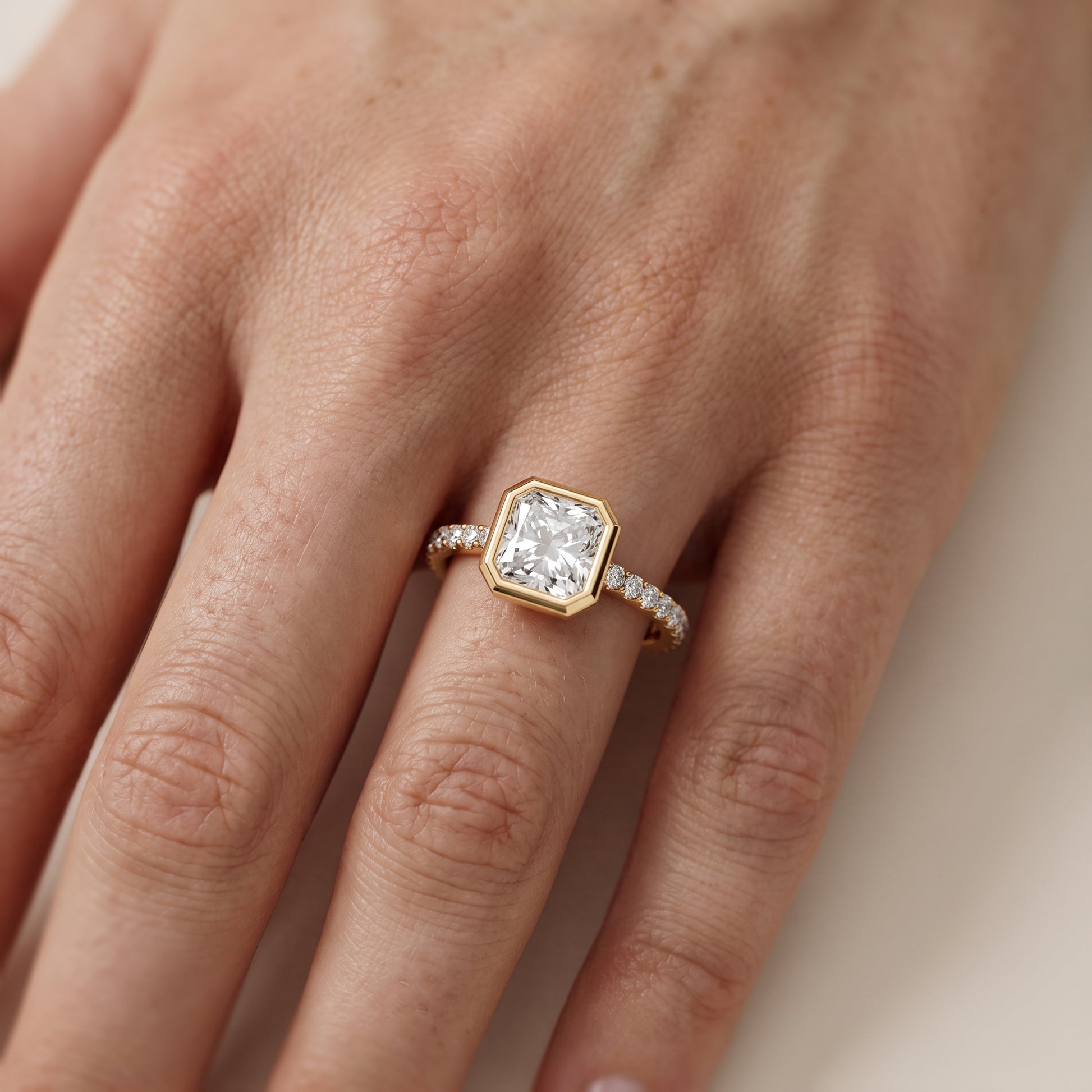 Cora Bezel Pavé Radiant Diamond Ring in Yellow Gold - lifestyle.jpg