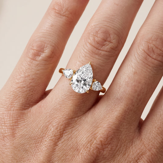 Phoebe Three-Stone Pear Diamond Ring in Yellow Gold - lifestyle.jpg