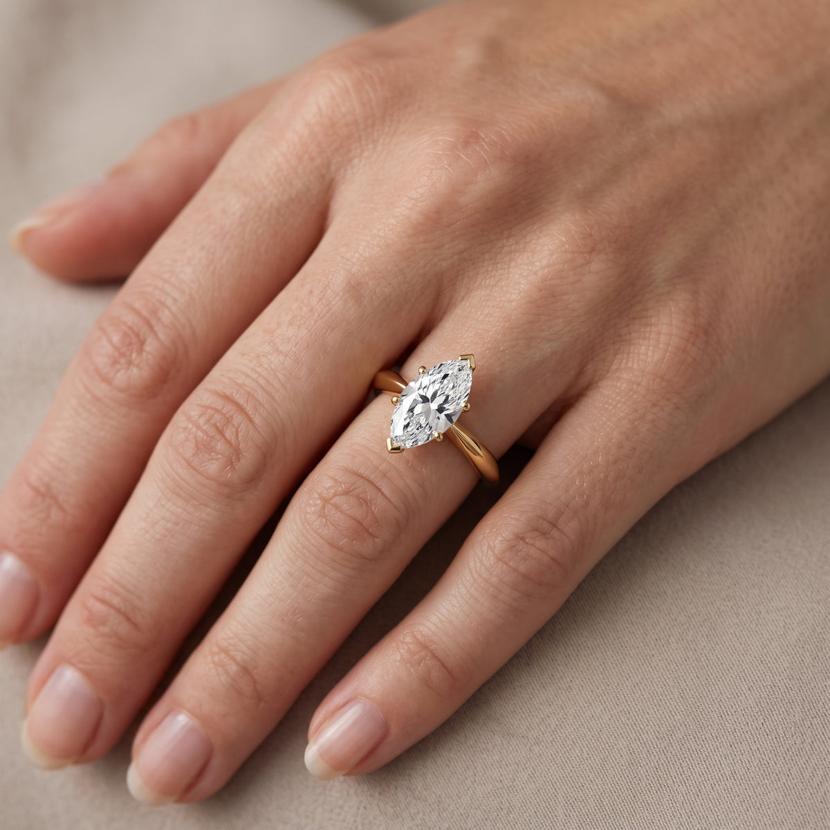 Arlette Solitaire Knife Edge Marquise Diamond Engagement Ring in Platinum - lifestyle.jpg