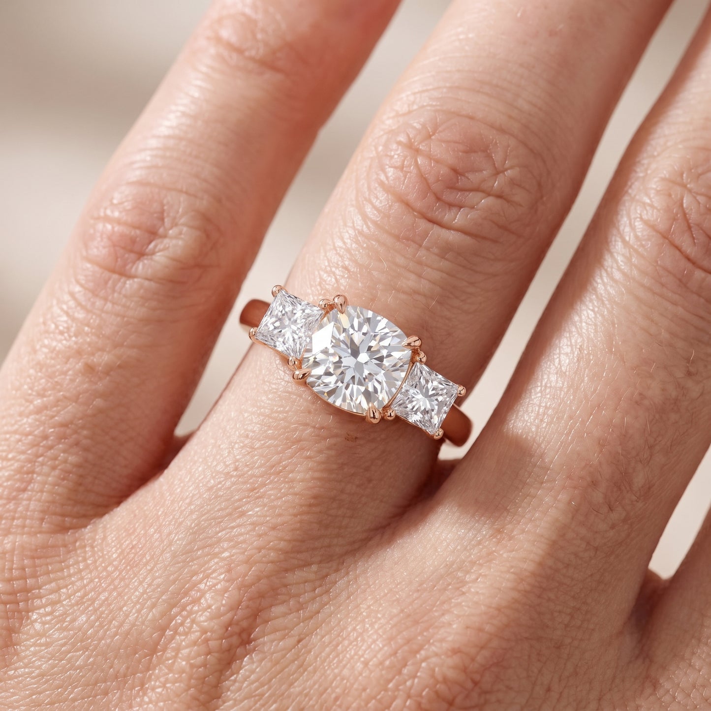Sienna Three-Stone Cushion Diamond Ring in Rose Gold - lifestyle.jpg