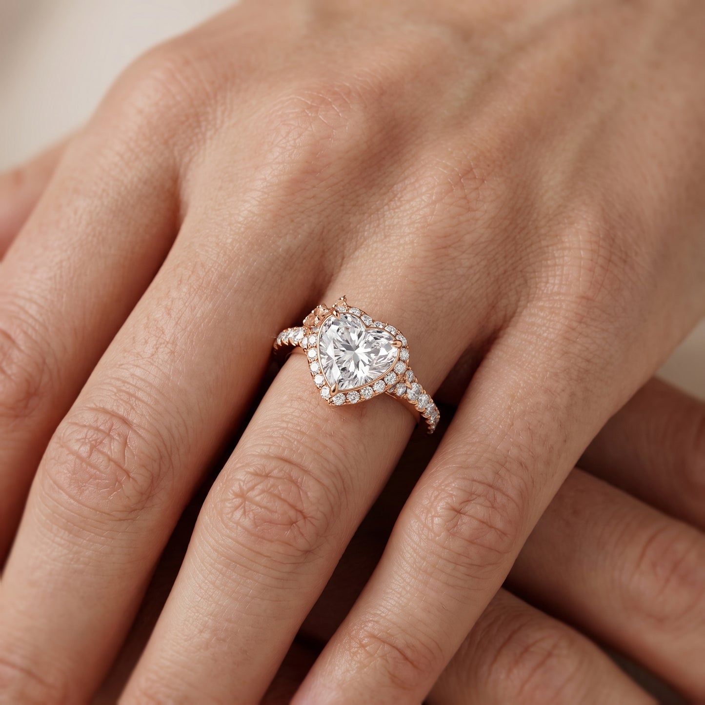 Bella Halo Pavé Heart Diamond Engagement Ring in Rose Gold - lifestyle.jpg