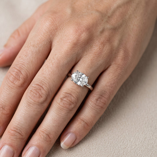 Maisie Four Prong Solitaire Oval Diamond Engagement Ring in Platinum - lifestyle.jpg