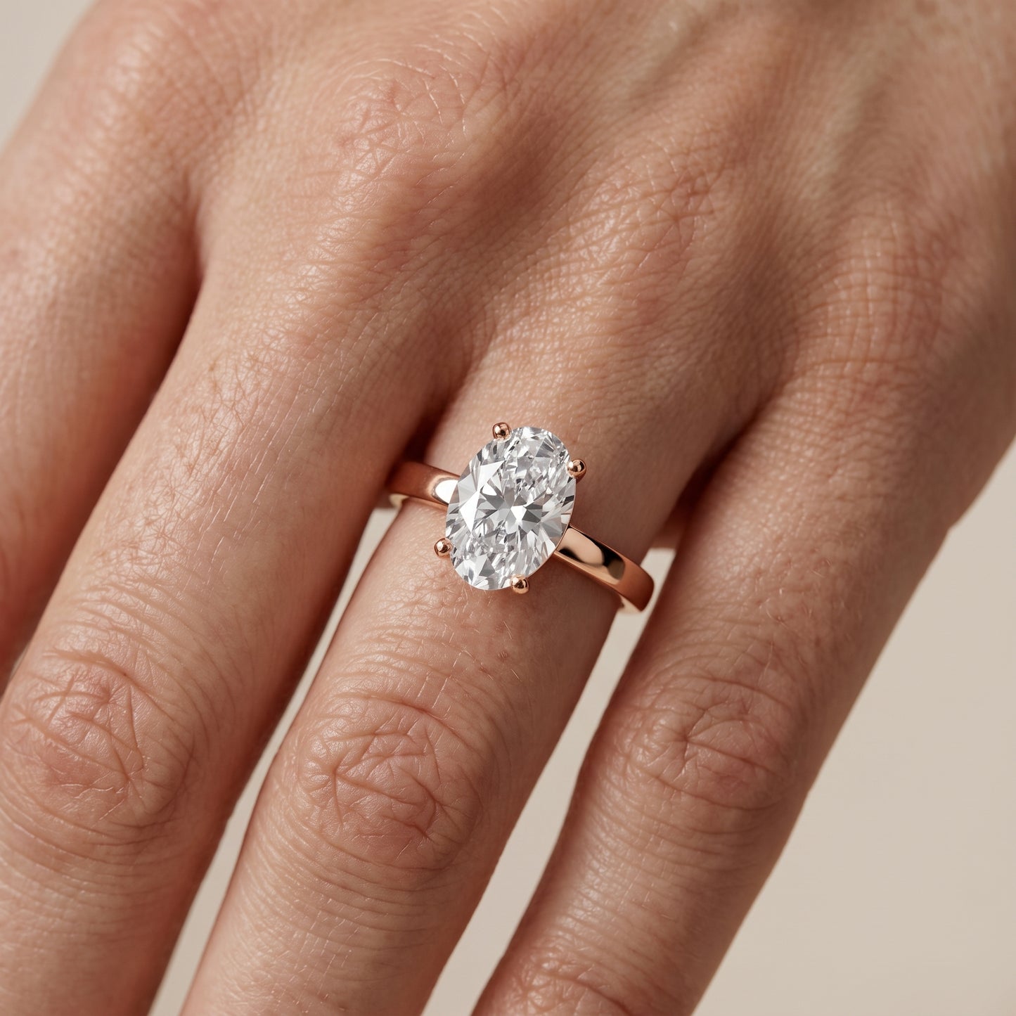 Delia Solitaire Oval Diamond Engagement Ring in Rose Gold - lifestyle.jpg