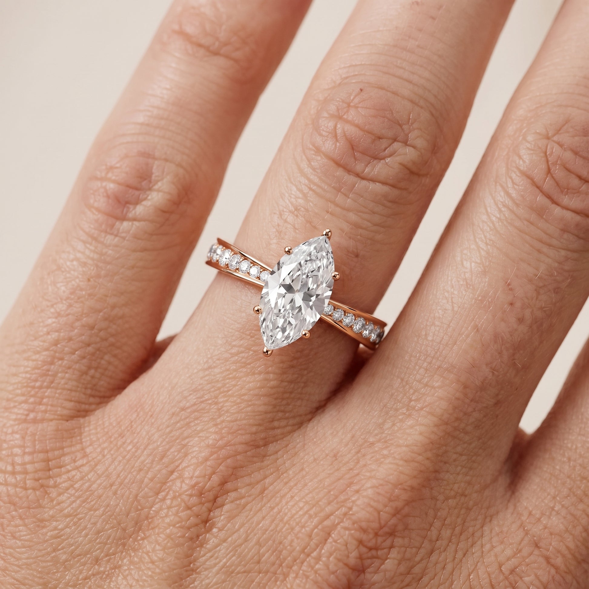 Rhea Sidestone Pavé Marquise Diamond Engagement Ring in Rose Gold - lifestyle.jpg