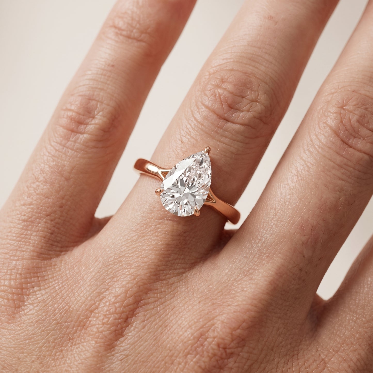 Anais Trellis Solitaire Pear Diamond Engagement Ring in Rose Gold - lifestyle.jpg