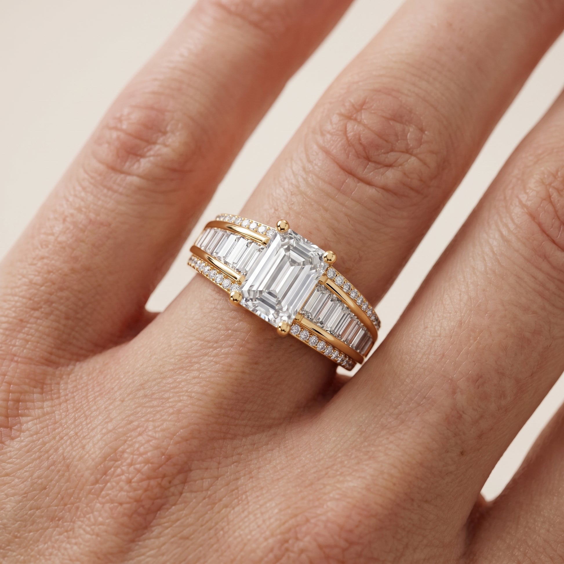 Halle Channel Set Baguette Accent Emerald Diamond Engagement Ring in Yellow Gold - lifestyle.jpg
