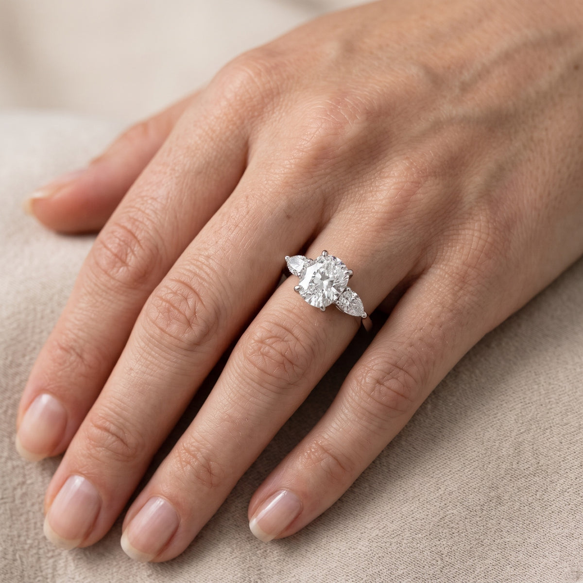 Grace Three Stone Cushion Diamond Engagement Ring in Silver - lifestyle.jpg