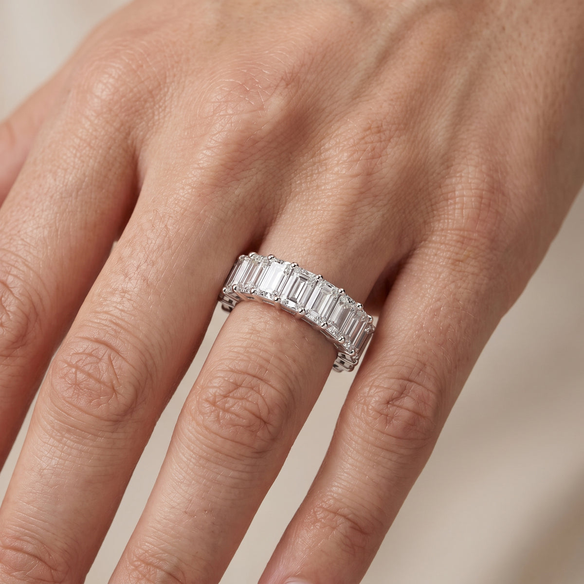 Adelaide Shared Prong Emerald Diamond Eternity Band in Platinum - lifestyle.jpg